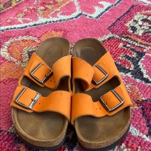 orange birkenstock’s